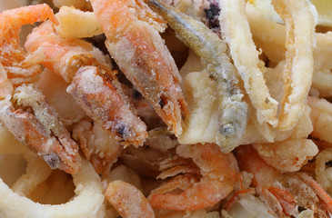 Macro photography of fried fish and seafood in the restaurant