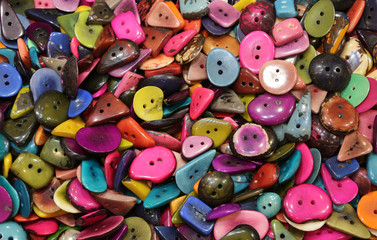 many colored buttons made with the palm tree