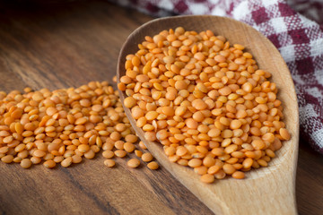 Wooden Scoop Full Of Red Lentils