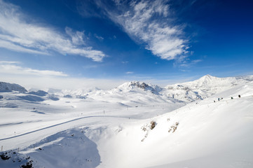 Alpine winter mountain landscape. French Alps with snow.