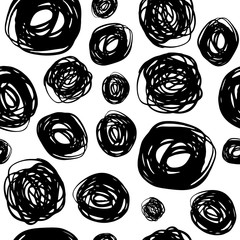Hand-drawn seamless pattern with circles, spots on a white background. Texture of black dots.