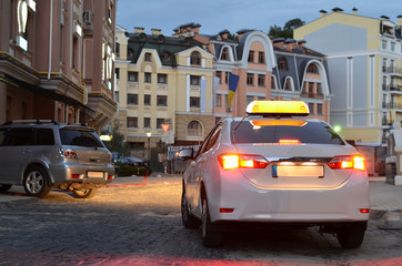 taxi car parked on night street