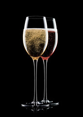 Yellow and pink champagne glasses with bubbles