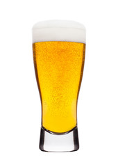 Cold glass of lager beer with foam and bubbles