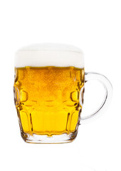 Cold glass of lager beer with foam and bubbles