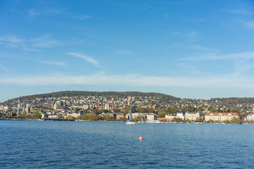 Fototapeta na wymiar lake zurich coast view with blue sky in summer