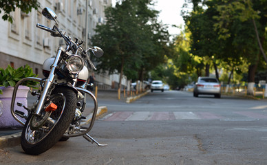 Obraz na płótnie Canvas chopper motorbike on street parked