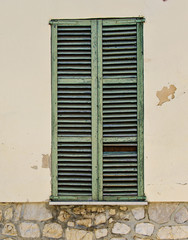 Fototapeta premium Painted window on a house in Majorca, Spain