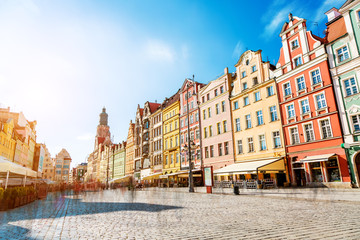 Fantastic view of the ancient homes on a sunny day. Location famous Market Square in Wroclaw, Poland, Europe. Historical capital of Silesia. Beauty world.