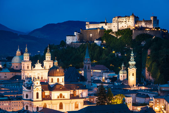 Great view from the top on an evening city shining in the lights. Location famous place (unesco heritage) Festung Hohensalzburg, Salzburger Land, Austria Europe. Beauty world. © Leonid Tit