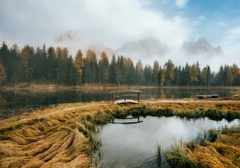 Tuinposter Great view of the foggy lake Antorno in National Park Tre Cime di Lavaredo. © Leonid Tit
