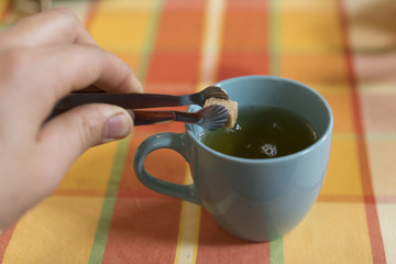 Cup of tea on a wooden table. The background. Layout. Mock up