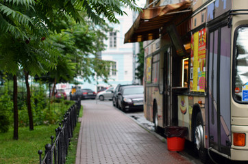 Fototapeta premium bus of street food blur background