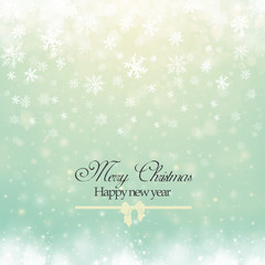 Christmas winter abstract background with snowflakes, bokeh lights and congratulations. Place for text. Christmas New Year's wallpaper