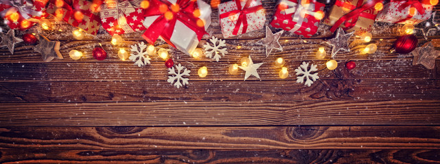Christmas background with gifts and wooden decorations © Jag_cz