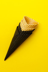 waffle cones on the yellow background
