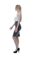 side view. successful business woman is moving forward. photo in full growth