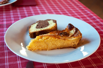 piece of homemade apple cake and chocolate cake