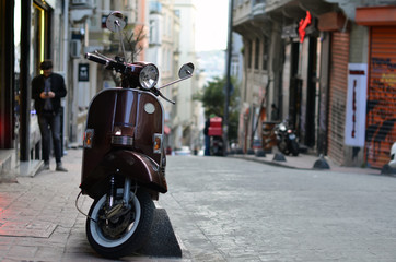 Obraz na płótnie Canvas scooter parked on street