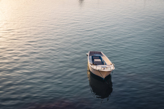 Fisherman boat in the harbour. Sunset in Giovinazzo - Puglia Italy