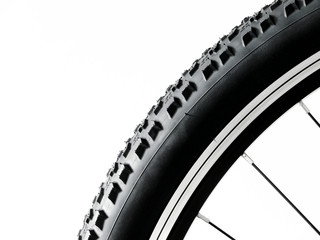 Black and alloy bicycle wheel isolated on white background