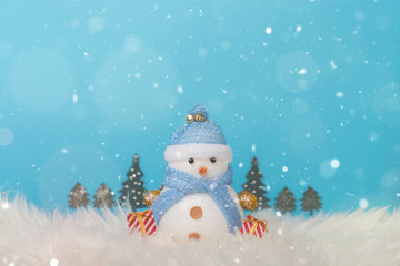 Christmas holiday background with Santa and decorations. Christmas landscape with gifts and snow. Merry christmas and happy new year greeting card with copy space.
