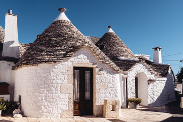 Fototapeta na wymiar Alberobello typical Trullo houses made by volcanic stones