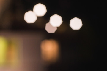 bokeh abstract background in shades of yellow, orange, brown and green