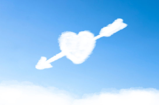 Heart shaped cloud with arrow.