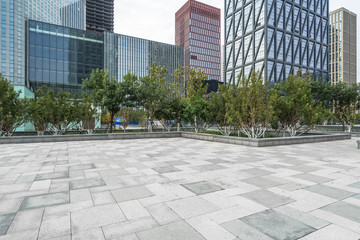 modern office buildings front of the empty square floor