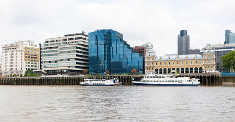 River Thames, London, England, riverside architecture, skyline and ferry transport