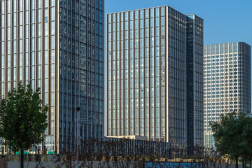 Modern office building against blue sky.