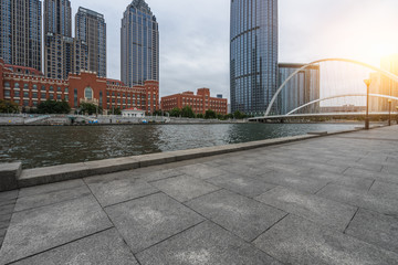 empty floor and city skyline under blue sky, tianjin, china.