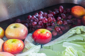 wash fersh fruit and vegetable in sink