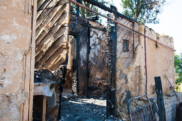 Ruins of house after fire