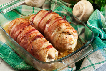 Baked chicken breast stuffed with champignon