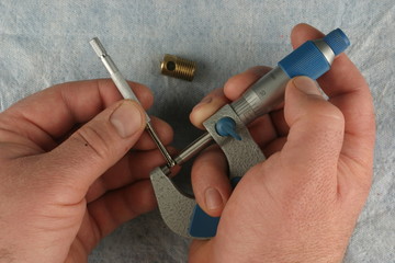 Imperial Vernier Micrometer,  small hole gauge, blue shop towel background, brass part