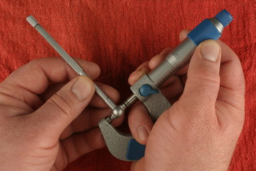 Imperial Vernier Micrometer,  telescoping gauge, red shop towel backgroundackground