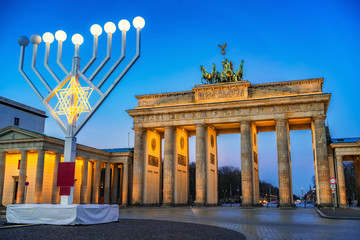 Brandenburg gate and and hanukkah menorah in Berlin, Germany