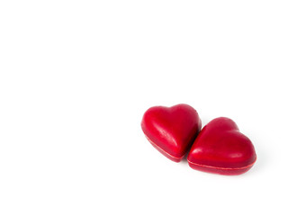 two heart shape chocolate candies