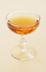 Fancy alcoholic drink in retro coupe