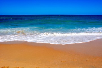 Fototapeta na wymiar tropical beach scene with golden sand