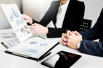 Administrator business man financial inspector and secretary making report, calculating balance. Internal Revenue Service checking document. Audit concept
