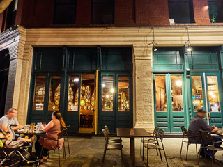 downtown night life scene people dining