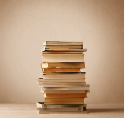A stack of books with vintage background