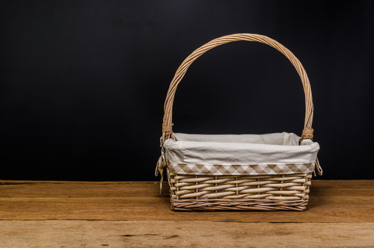wicker basket on wooden table