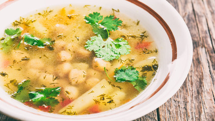 Pea soup with potatoes, vegan food