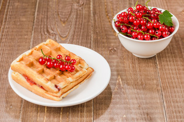 wafers with red berries/wafers with red berries. Selective focus