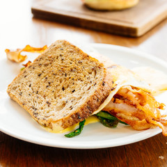 Sandwich with avocado bacon and asparagus