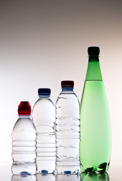 Plastic bottles of water isolated on a white background